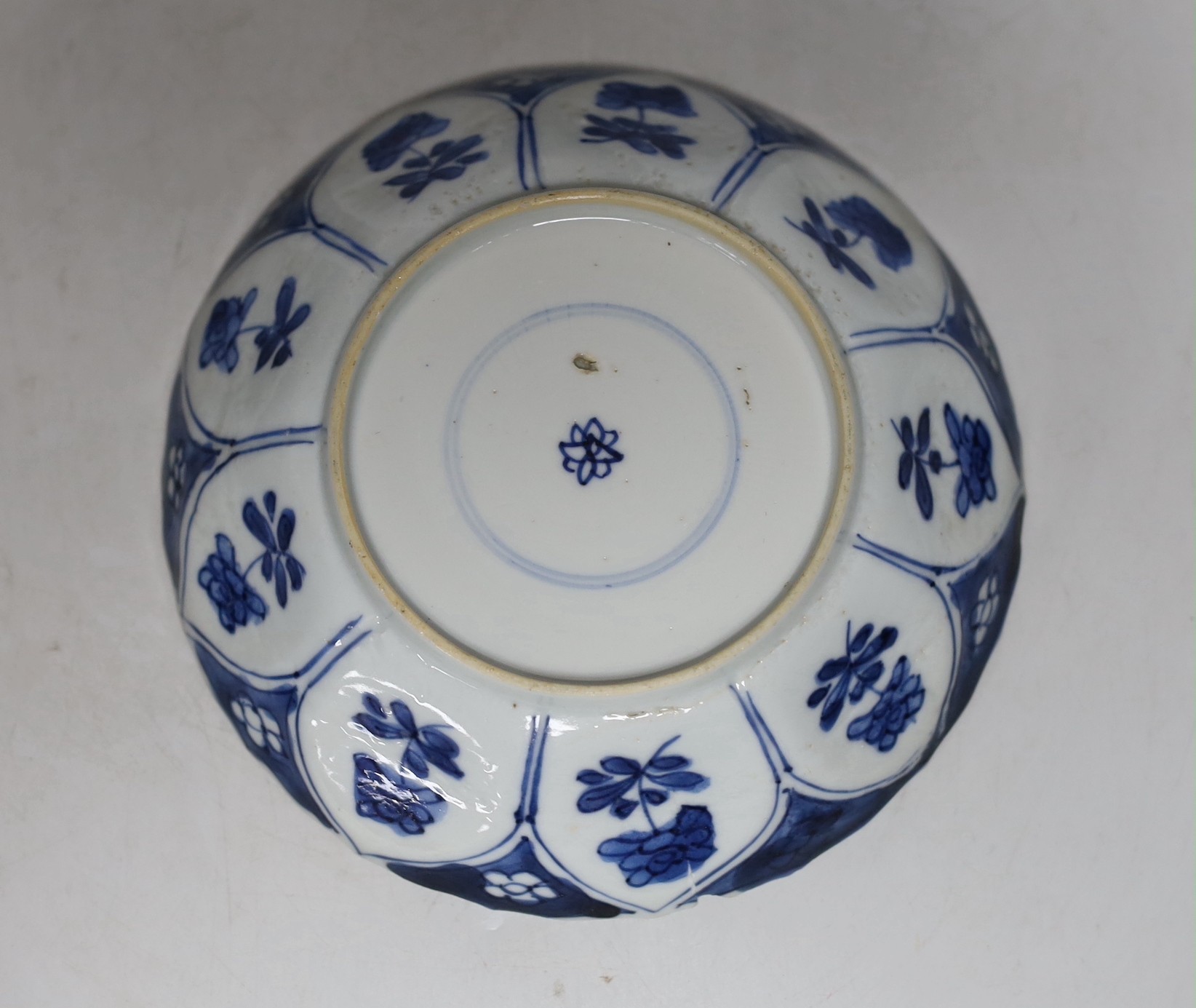 A Chinese blue and white prunus jar, two miniature vases and a dish, all Kangxi period, jar 14cms high